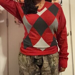 Red and black argyle sweater